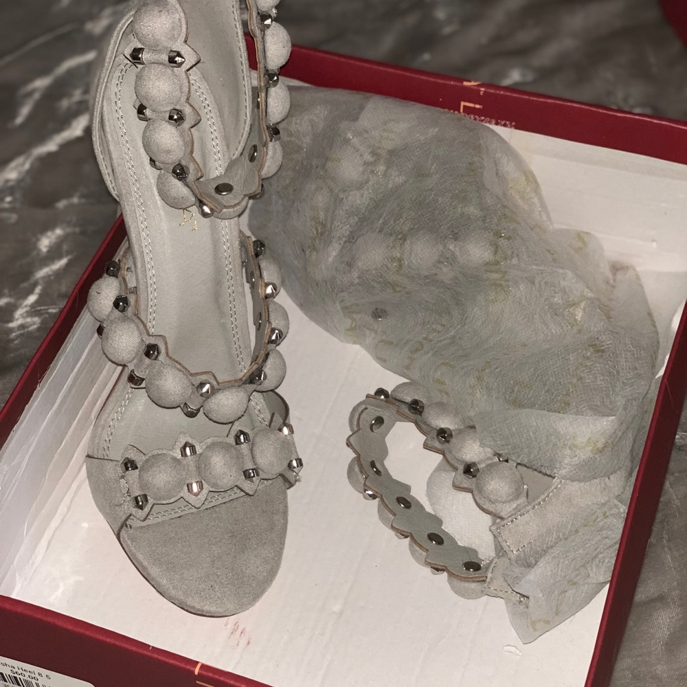 Gray high heel shoes..